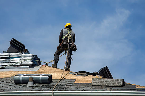 Professional Roofing technician working in Goshen, CA